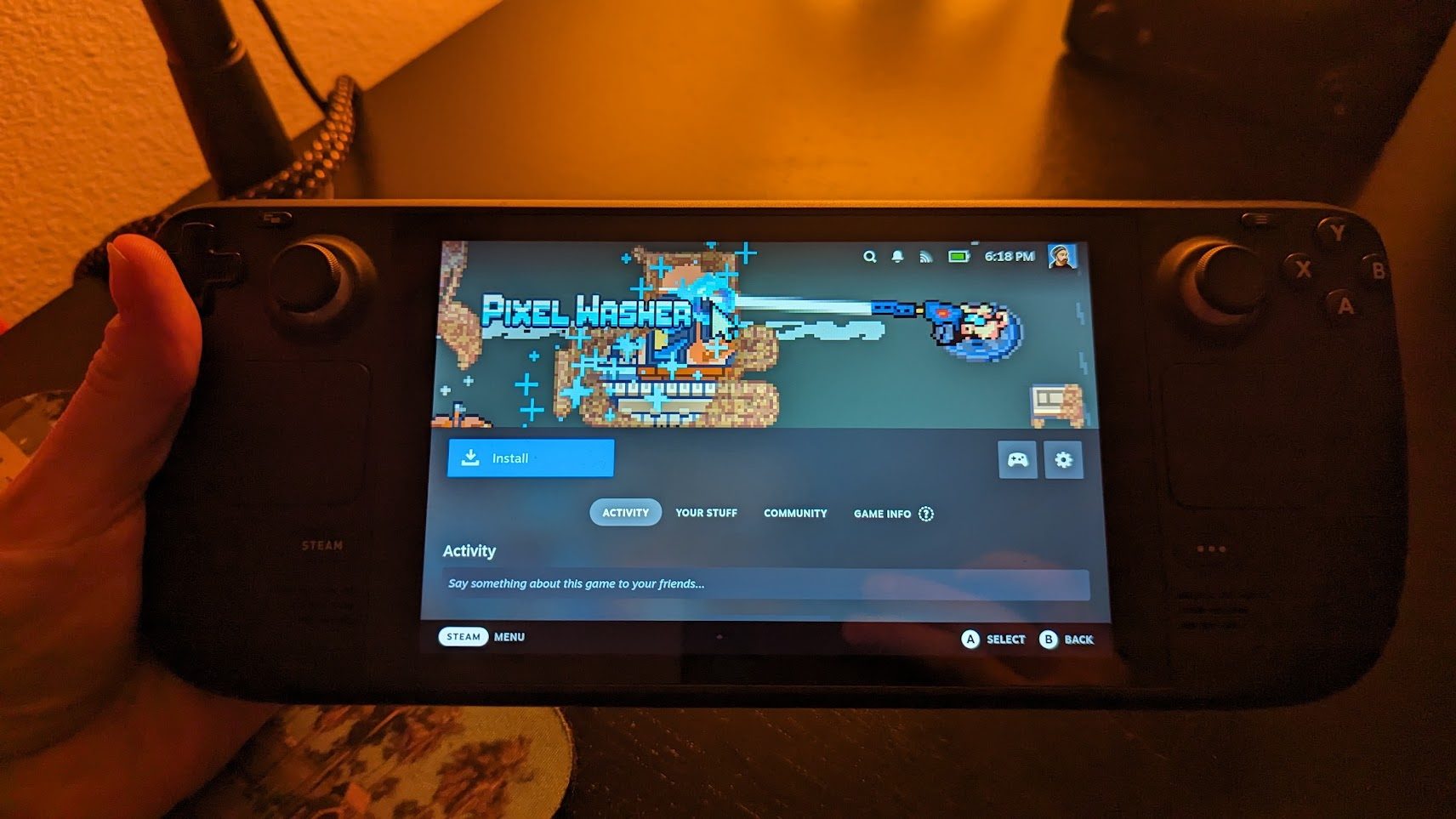 A picture of a Steam Deck showing an early version of Pixel Washer